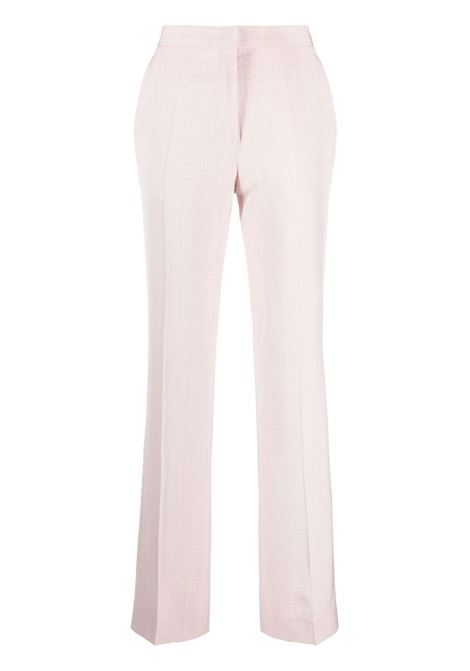 Pantaloni sartoriali con pieghe in rosa - donna